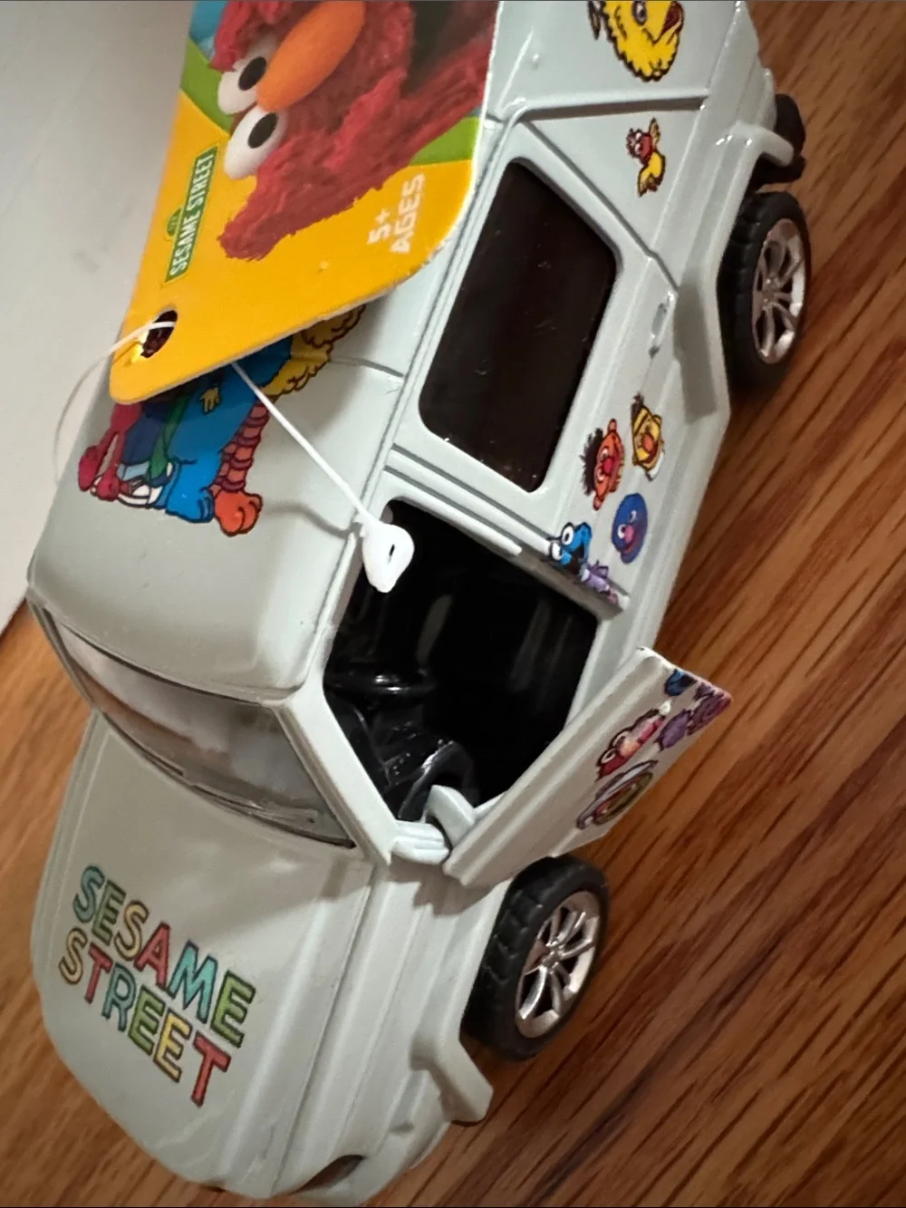 Sesame Street Silver Mini Van with Colorful Character Art doors open NEW w tags